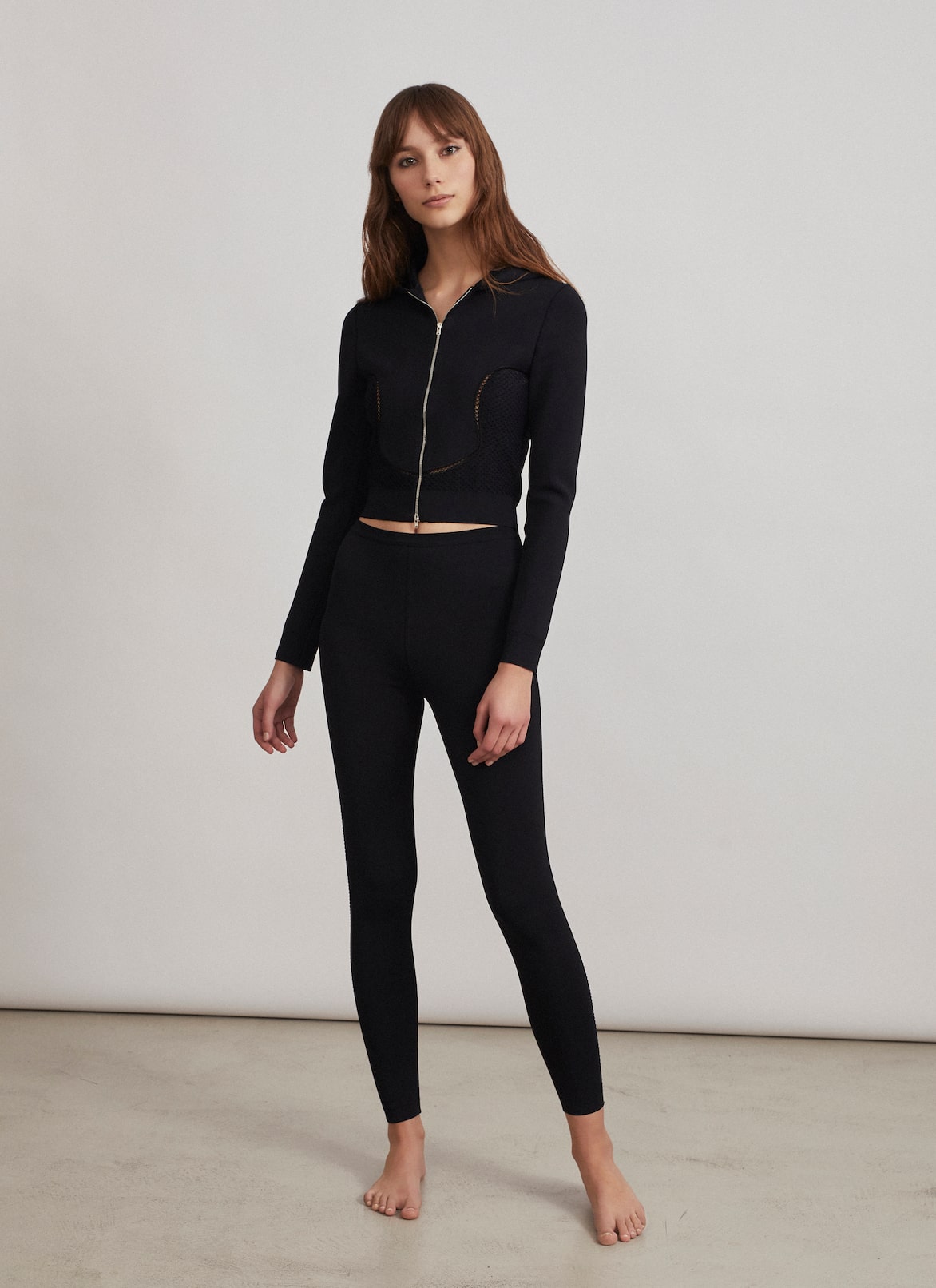 Technical knit zipped jacket
 ALAÏA BLACK TECHNICAL KNIT ZIPPED JACKET